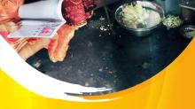 bangladeshi woman and child cooking indoors