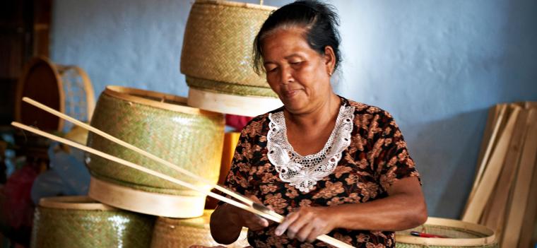 Rural Women Light Up Their Homes in Lao PDR woman weaving
