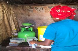 woman cooking. Soweto, South Africa